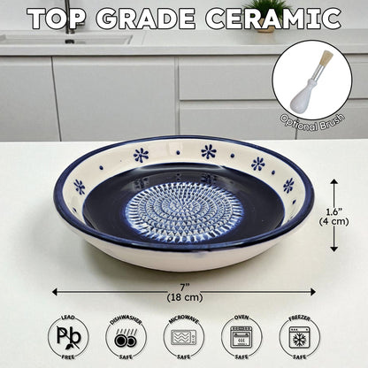 Top grade ceramic garlic grater bowl with measurements and safety icons on a kitchen counter.