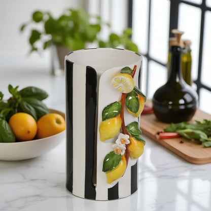 Decorative paper towel holder with lemon design on a kitchen counter