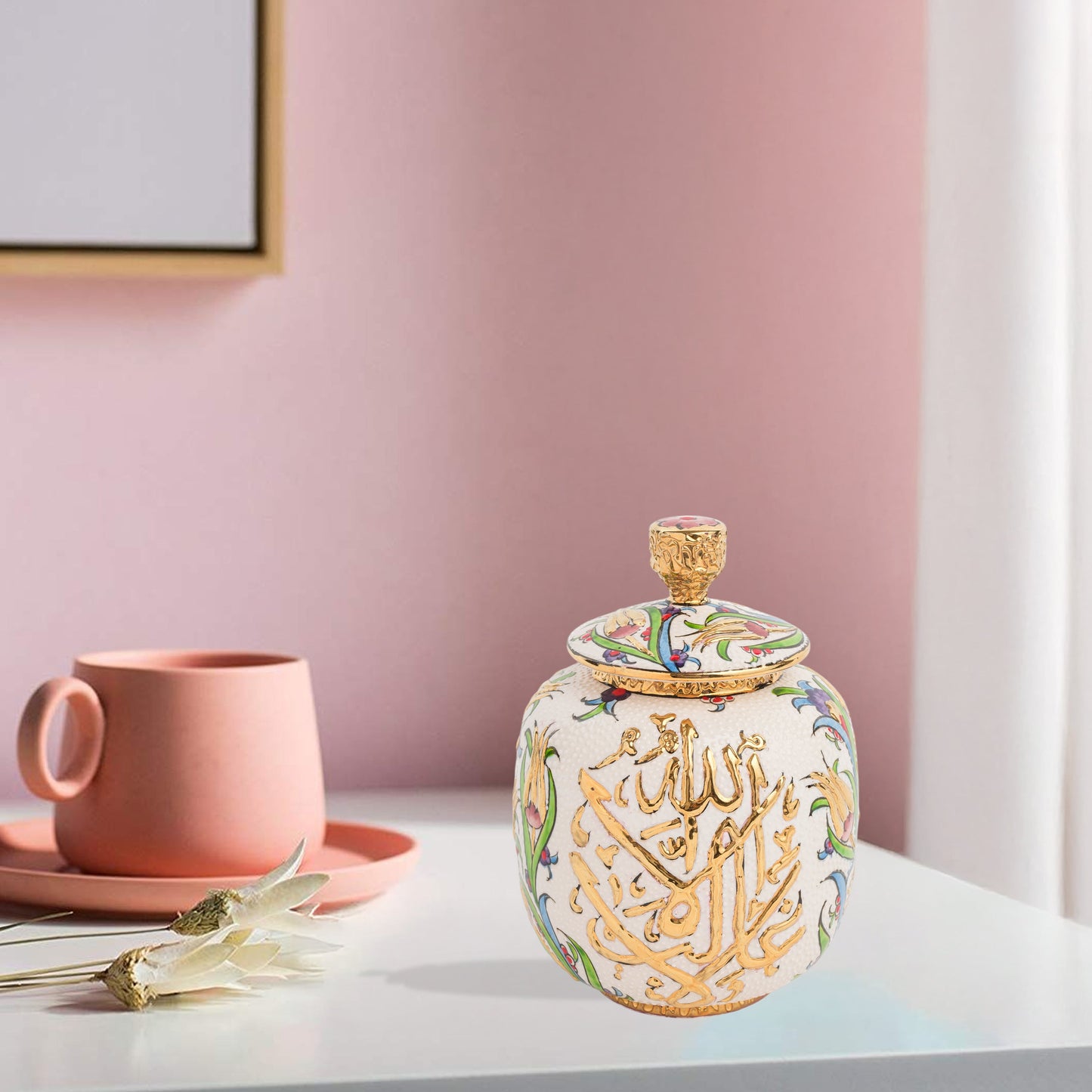Hand-painted Divine Script ceramic jar with golden Arabic calligraphy and floral motifs. Lidded artisan jar, perfect for honey, ginger, spices, or spiritual décor.