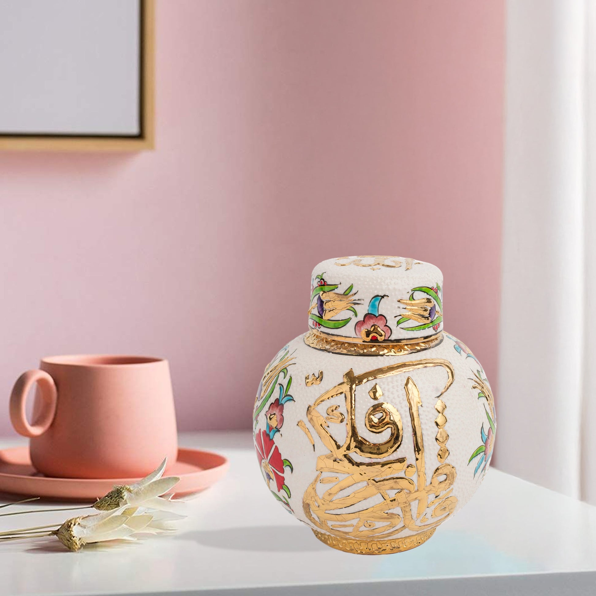 Hand-painted Gold Calligraphy ceramic jar with Ottoman floral motifs & Arabic script. Round melon-shaped design, glossy glazed, perfect décor or gift.