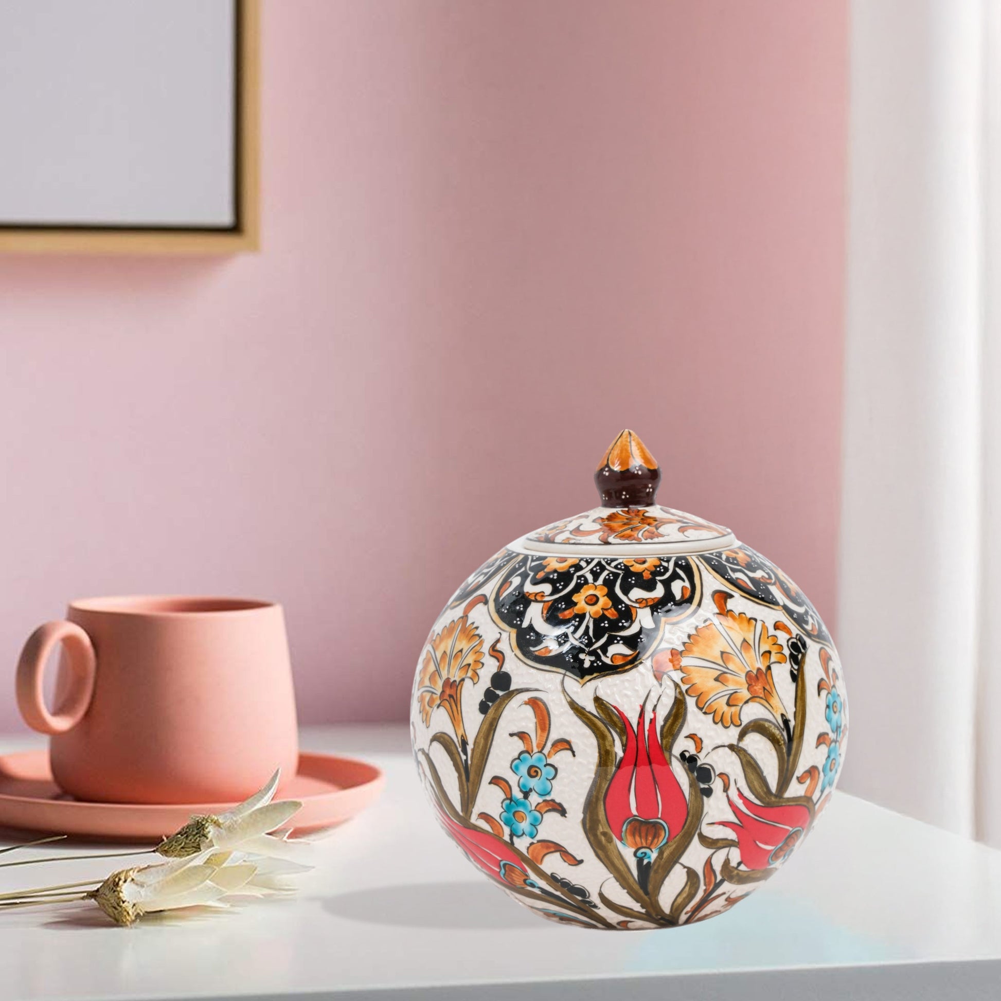Hand-painted Red Tulip globe jar with Ottoman floral motifs in red, blue & gold. Glossy round ceramic jar, artisan-crafted, perfect décor or thoughtful gift.