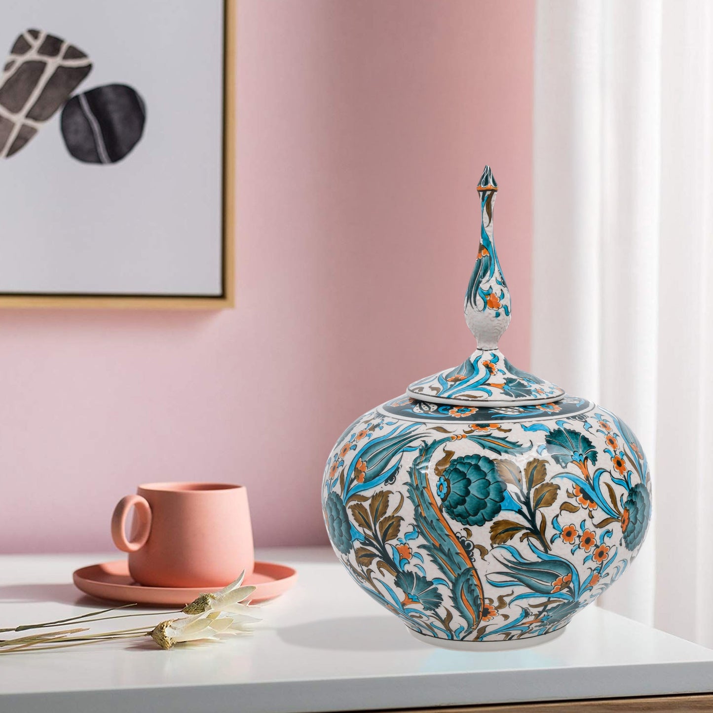 Hand-painted Iznik Bloom globe jar with teal blooms, tulips & vines on white. Bulbous Ottoman-inspired ceramic jar with finial lid, perfect décor or gift.